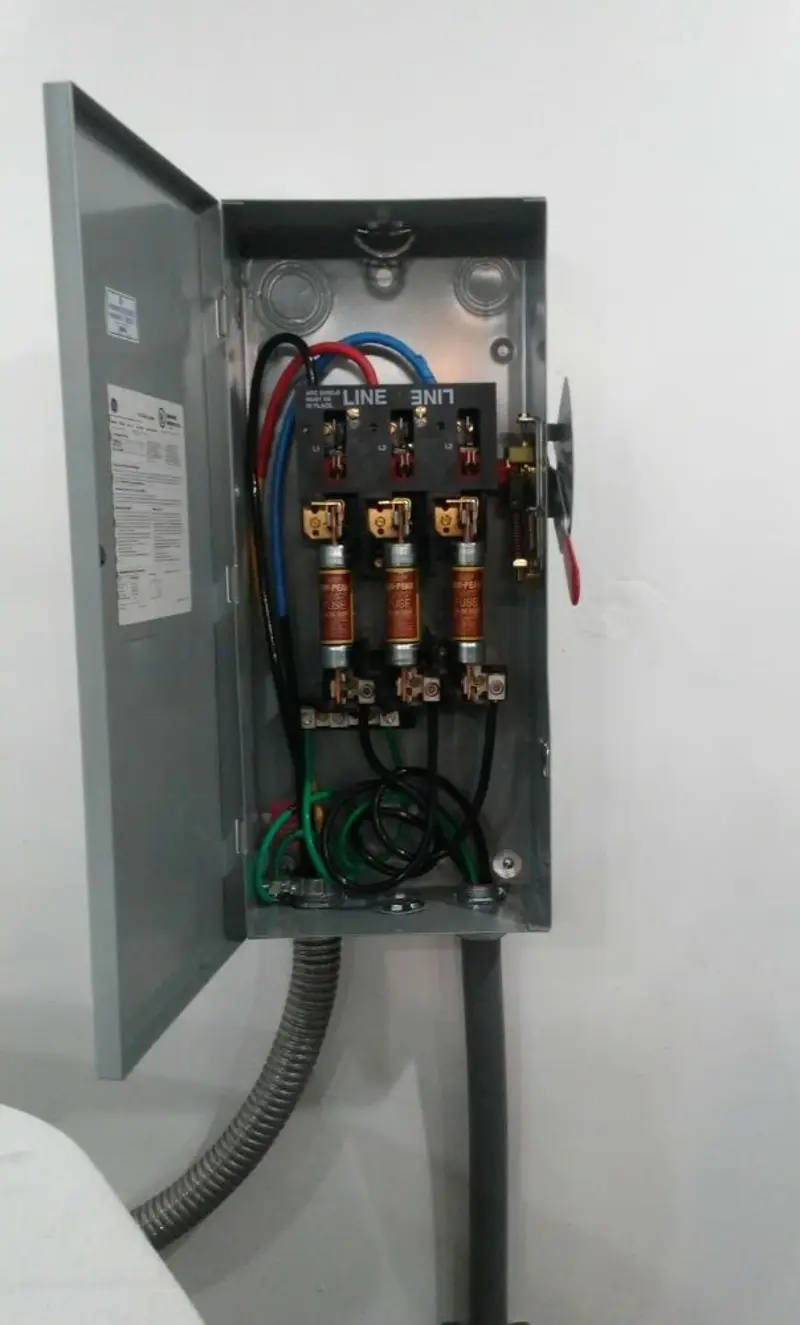 Three-phase disconnect switch installed for Smoke Detector Installation in Newport Beach